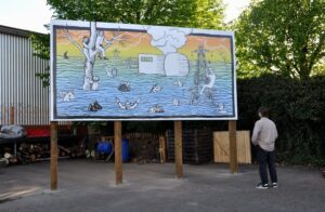 Billboard artwork outside Spit & Sawdust