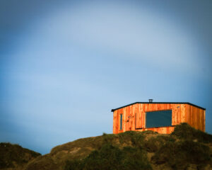 Hikitalo sauna sitting on the banks of Sandy Bay, Porthcawl