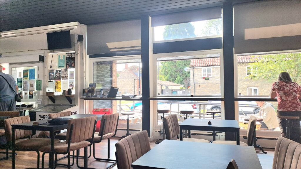 Photograph of Nettleham Community Hub's light-filled cafe and library space.